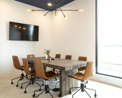 Large meeting room - great for up to 8. Connect to TV on wall with airplay or HDMI, large whiteboard in back of the room