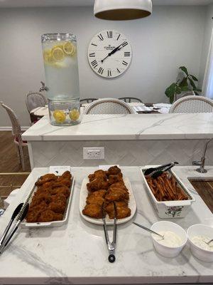 Wings and sweet potato fries catered from Tim's!