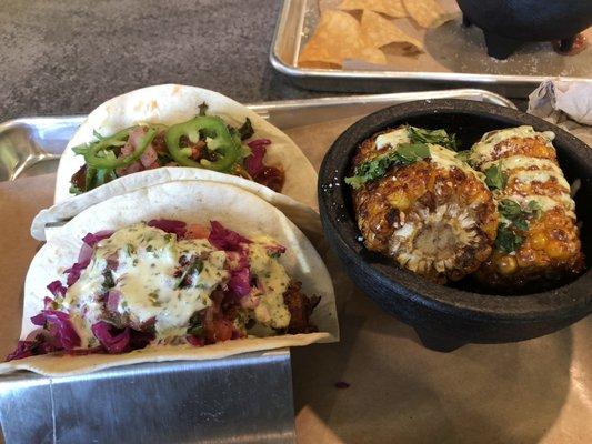 Shrimp taco, brisket taco and Mexican corn