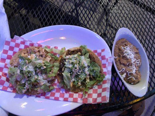 Chicken tostada, shredded beef tostada, and refried beans