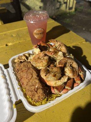 Mac and cheese, shrimp, crab, fried chicken and rice