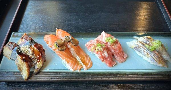 A La Carte - Unagi (bbq eel), New Zealand King Salmon with truffle slice in oil, Toro Neki, Aji (spanish mackerel)