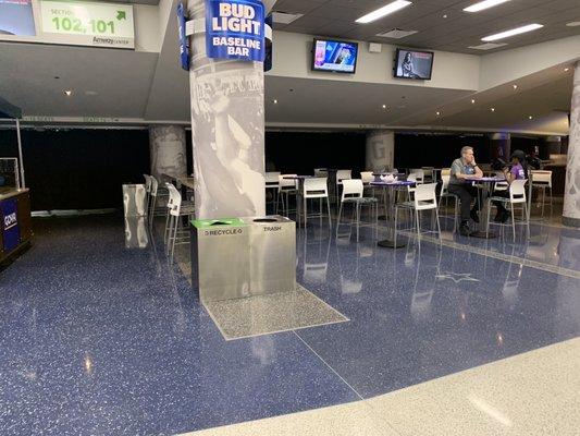 Eating area across from the counter. The owner is the older gentleman on the right. (Nov 2019)