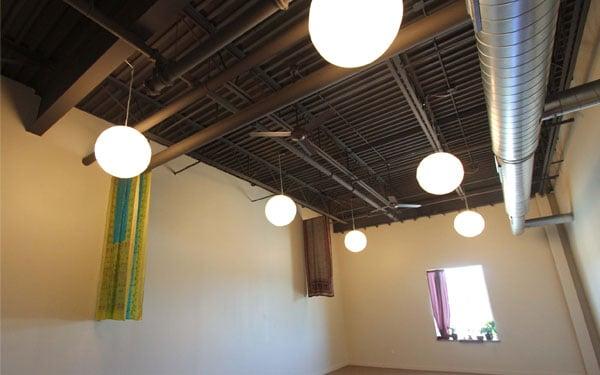 18 foot ceilings will fill your yoga practice with light and space!