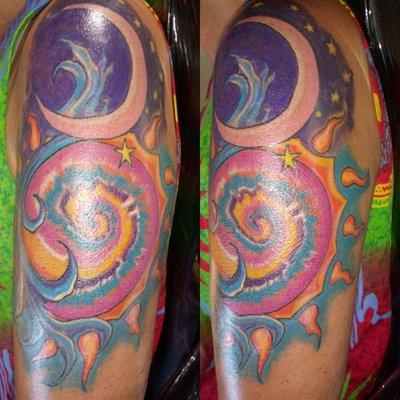 Colorful art piece Designed by me . This tattoo has elements that have meaning to the Canvas . Two session tattoo .