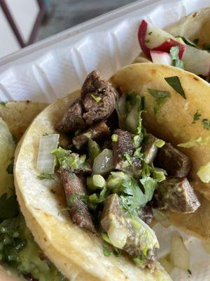 $5 Lengua (Beef Tongue) Taco. Super soft tender beef, with a "beefy/liver" undertone FYI. Try it though!