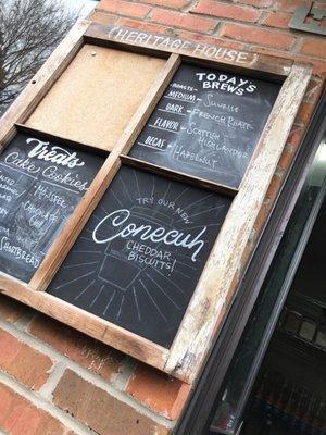 Write outside the drive thru window is a board to write "specials " of the day.