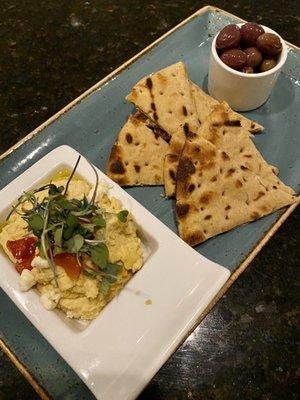 Mediterranean Hummus - roasted red pepper, olive oil, grilled pita, crumbled feta, kalamata olives