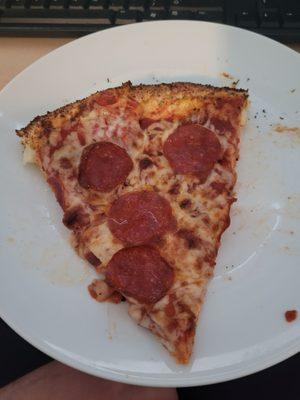 Pepperoni pizza with stuffed crust and Cajun butter garlic seasoning on the crust