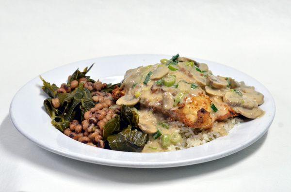 Chicken Kentuckian - our signature dish of pan-fried chicken in a bourbon, mushroom cream gravy