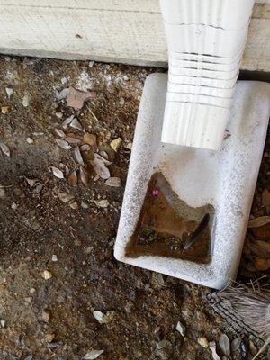 One of many gutters & blocks installed at our home. The concrete blocks were installed incorrectly and the owner refused to come correct.