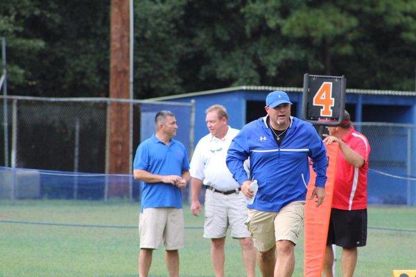 Mr. Biering on the football chain gang