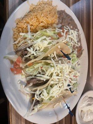 Shredded beef tacos + cheese