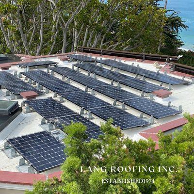 Custom San Clemente Home with a newly designed tapered roof system protected by a CertainTeed Hybrid roof system.