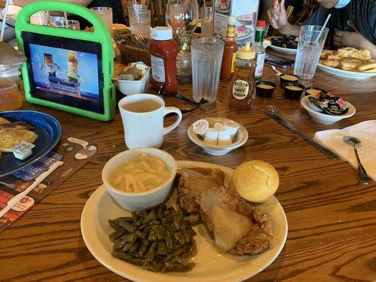 Country fried pork chops, dumplings and green beans.