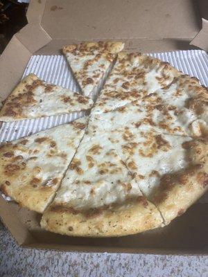 Dry cold pizza  missing topping