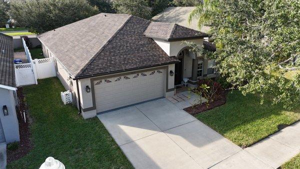 Angled shot of a new roof completed by Steadfast Roofing...a roofing company in Ruskin, FL.