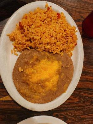 Rice and beans (plate only cones with one, not both)