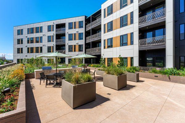 Multiple outdoor dining areas throughout the community