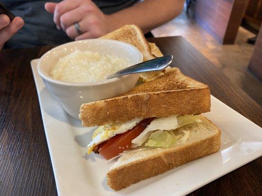 The Market Executive Sandwich with grits