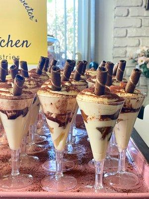 Tiramisu cup, a must have for your event or party! Espresso soaked lady's finger cake with Mascarpone mousse with cocoa dusting.