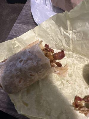 Steak and egg breakfast burrito. With bacon not steak.