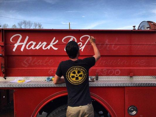 Handpainted sign going on the firetruck by Chastain Brand.