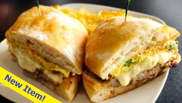 NEW ITEM. Hit and Run. Scrambled eggs, Sausage Patties, Mayo, Swiss, Green Peppers, onions, Bakery Fresh Ciabatta Bread, side of Hash Browns