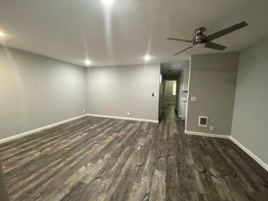 spacious living room with hardwood style floor at 100 Union Ave Apartments