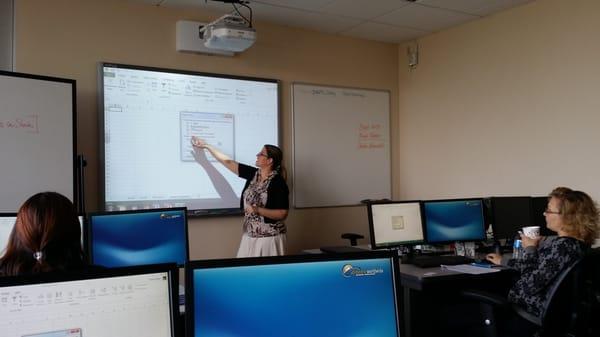 #DWWTC Lead Microsoft Apps Instructor Sheila Mansolillo showing students how to navigate the many features of #Excel.