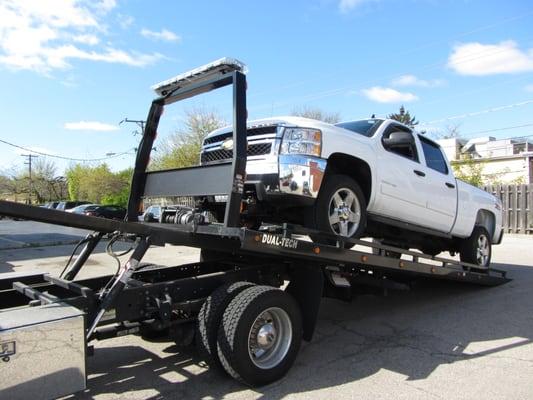 We do flatbed towing and we can tow extended cab trucks too.