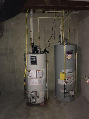 New 50 gallon Bradford White water heater on the left.