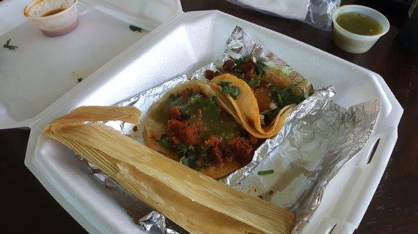 Chorizo tacos and tamale.