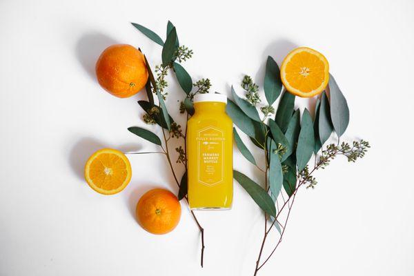 Freshly pressed orange juice without preservatives, added sugars or processed in any way.