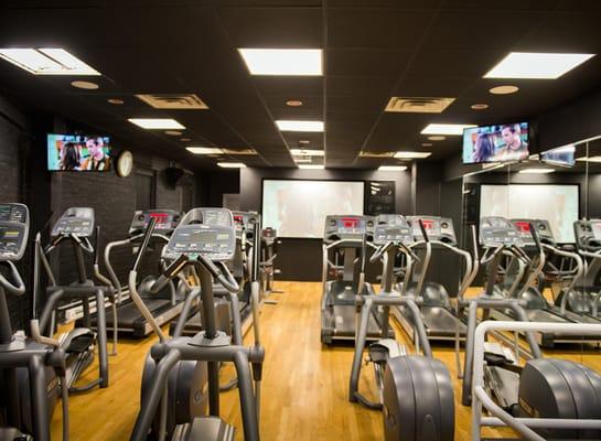 Watch the movie of the day while you sweat in our cardio theatre at our Marine Park gym!