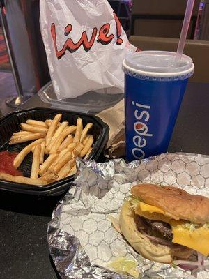 Smashed cheeseburger with fries and a root beer