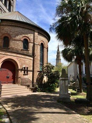 Circular Congregational Church with the tower of St. Phillip's in the background