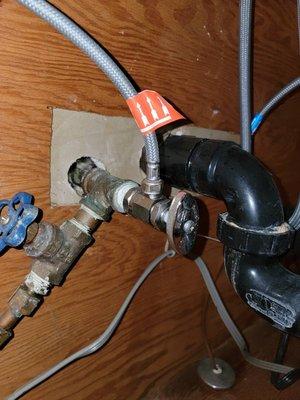 Reconnect dishwasher supply line, discharge hose and power