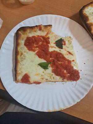 A piece of grandma's pizza.