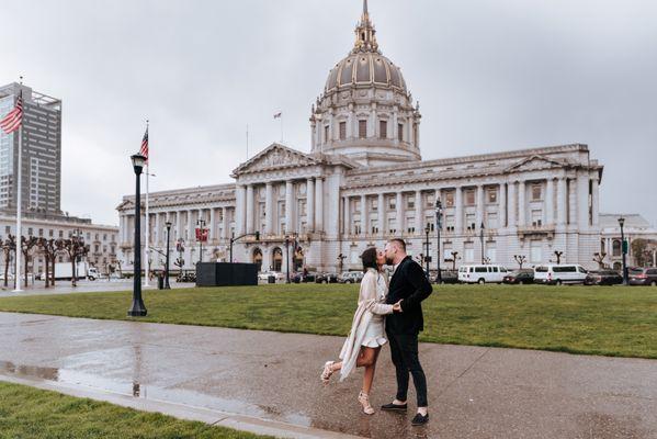 A kiss in front of SF city Hall