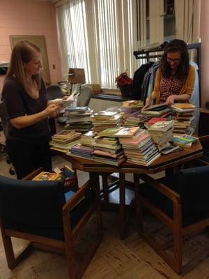 Happy teachers from a school which now has a library thanks to those who donated books!