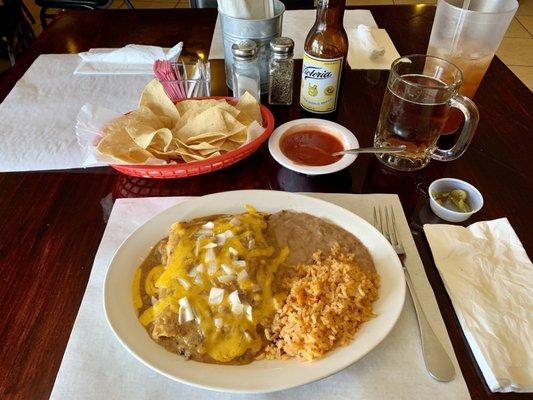 3 beef enchiladas with rice and refried beans. Chips and salsa aVictoria beer and iced tea.