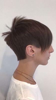 Graduated in the back. Scissor over comb on side and disconnected fringe