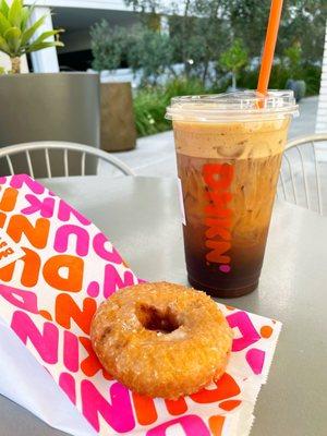 Glazed blueberry donut with brown sugar cream cold brew.