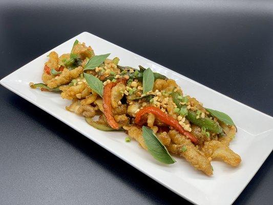 "Shanghai style" Fried Calamari! Tossed with an Orange ginger glaze, Thai basil, topped with crushed peanuts.