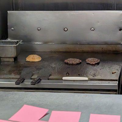 Burger patties on the grill