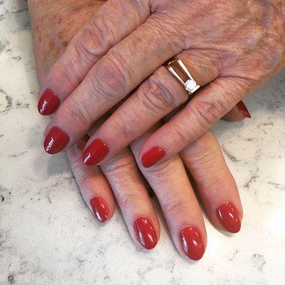 Tom done a great job on shellac manicure. Color: DND 02