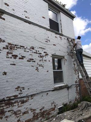 Peeling brick