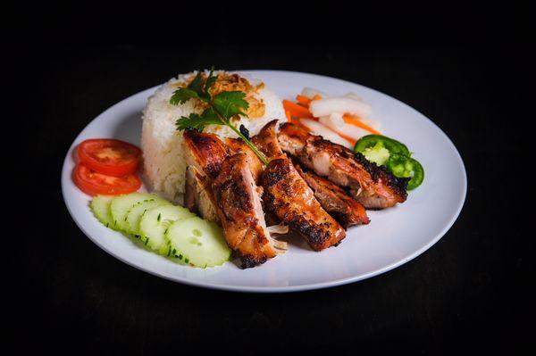 Our signature dish, coconut rice w. Chicken. You will happy w. This dish.