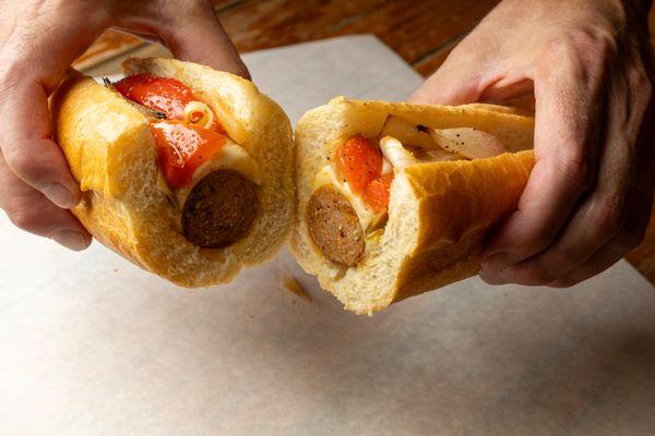 Sausage Sandwich! Mild Italian sausage, provolone cheese, roasted onion, and bell pepper on a hoagie roll!